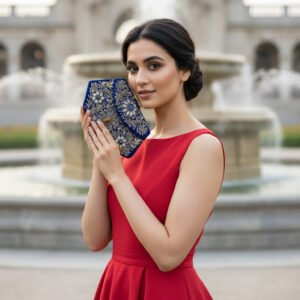 Ocean's Elegance" Boat Shape Handmade Blue Velvet Clutch: A Gemstone-Adorned Masterpiece